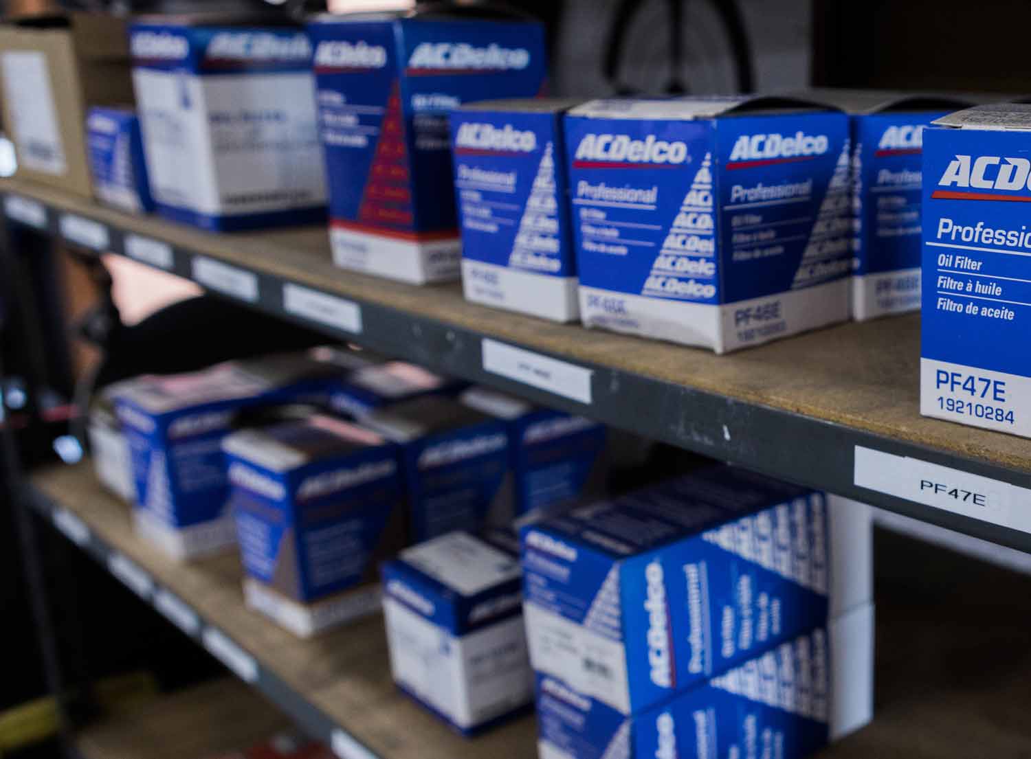 Boxes of auto parts sitting on shelves